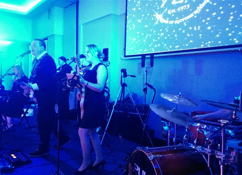Pulse function band Glasgow & Ayrshire on stage at St Andrew's Sporting Club Winter Ball in the Radisson Blu Hotel in Glasgow